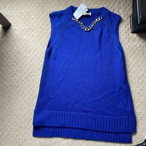 Royal blue sweater with silver rope chain necklace